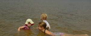 Girls swimming in Lake Jean.