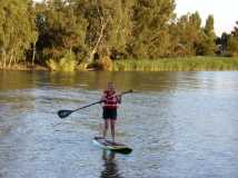 Grand daughter first time kayak board paddling