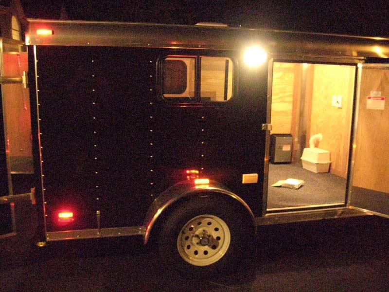 No-flash ambient light image of trailer at night.