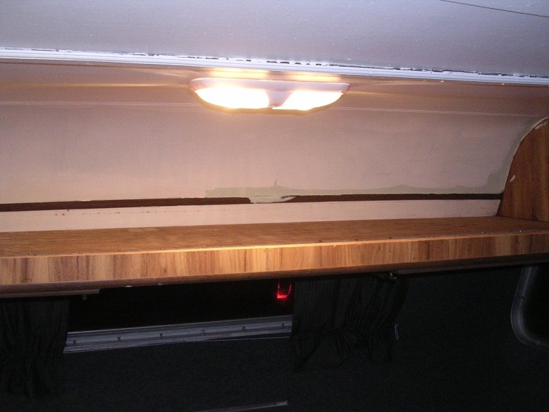 Upper cabinet/bed