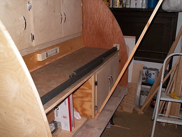 Hatch props laying flat on galley counter top