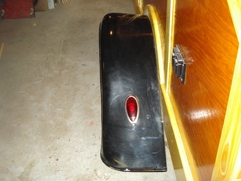FENDER INSTALLED / LATE 30'S STYLE REAR FORD.Painted black to match the car 's colour