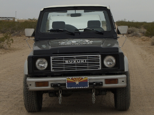 Suzuki Samurai tow vehicle from front