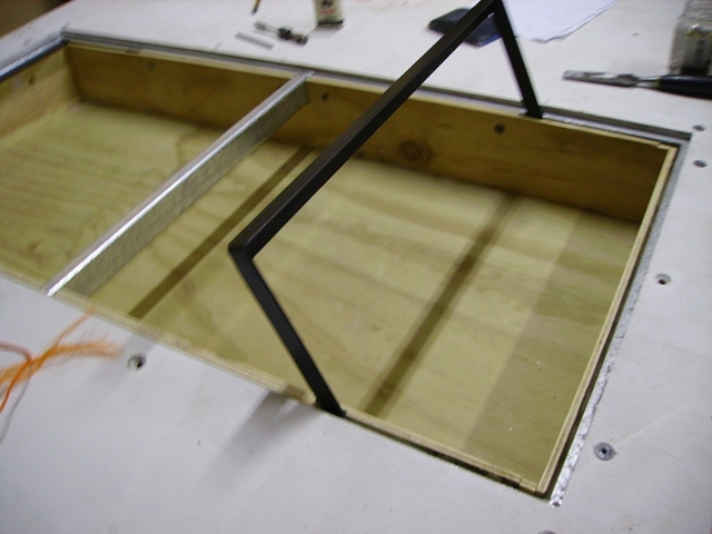 This bracket is designed to hold up the lid of the underfloor storage so you can use both hands to pack with the weight of the mattress above.