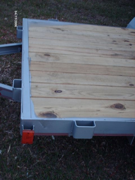 Floor of Trailer prior to Removal of treated lumber