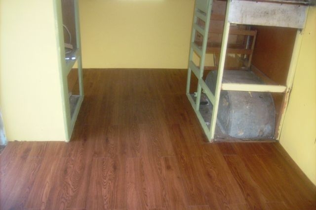 New flooring, front to back view & new rear wall.
