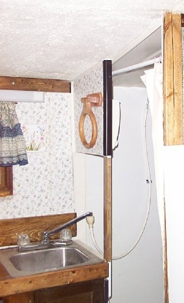 sink and entry to shower/bathroom