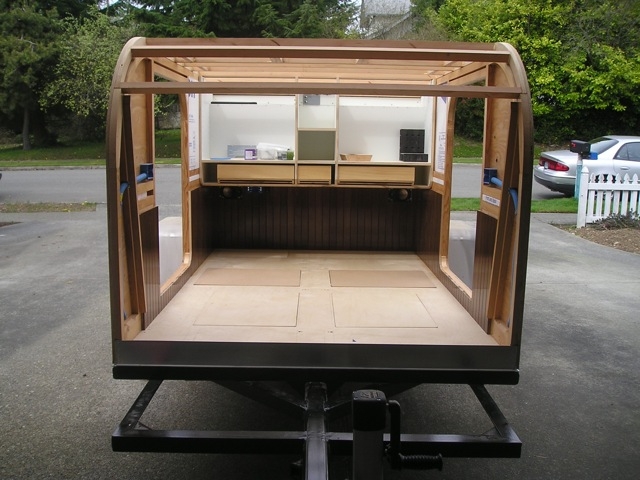 Trailer with roof assemblies in place