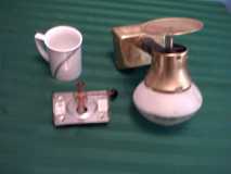 A humphrey Model 4 T - separated front and back - coffee cup for scale