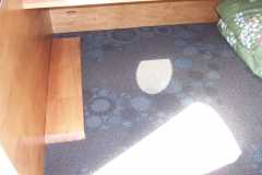 Carpet and wheel well cover