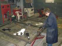 Apprentice working on frame