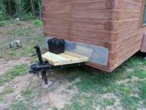 my log cabin camper now has a deck in progress.