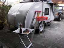 Working on waterproofing galley hinge