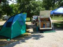 Clamshell sidetent