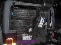 Jeep Loaded with Tires 2