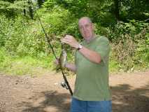 (Me) Galen with a Rockbass from stream at bottom of Pleasant Hill Lake Park