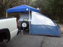 $20 side tent fits/works AOK