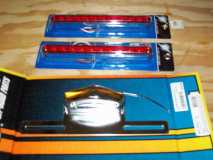 (0258) LED tail/brake lights, 9" long with 10 LEDs each. A license plate light & hanger ($15) from a VW Bug, new of corse.