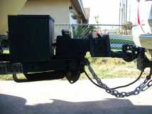 Pintle hitch with surge brakes