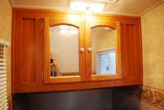 Mirrored cabinet door fronts