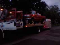 Big Red on the flatbed w/ the Sprite in tow