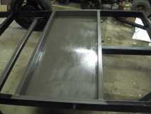 Belly pan storage compartment in and painted.