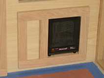 Elec. heater mounted in lower cabinet door