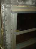 view of front window spacer and bucked rivets