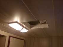 This is a picture of the light and vent inside the camper.