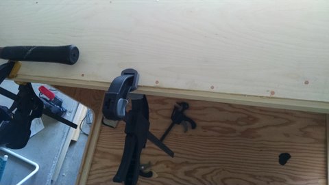 Attaching first roof panel.jpg