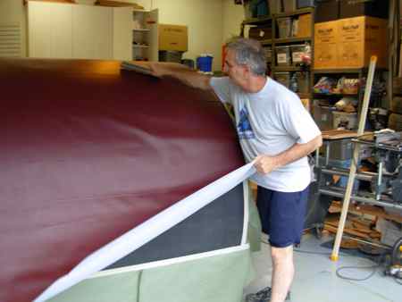Applying vinyl covering.jpg