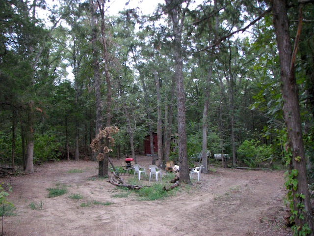 View of the fire pit area right in front of the trailer.JPG