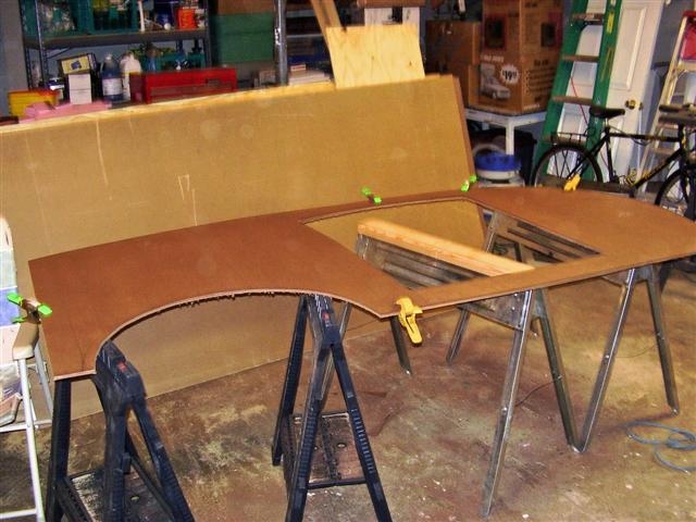 Side profile with door and wheel cut.
