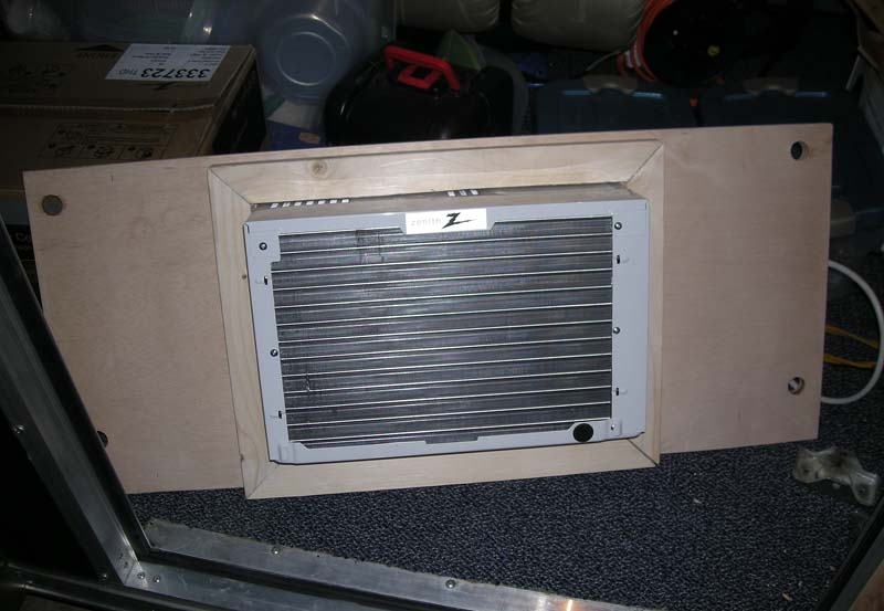 AC unit -- side facing outside trailer.