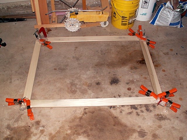 Clamping and gluing up the trim frames for the doors.  Weather stripping will be attached to the trim, sealing the doors on the outside.  Inside may get a second seal.