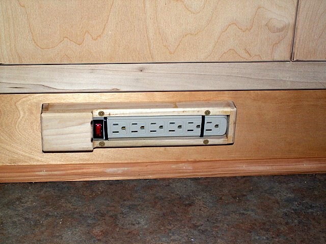 Built in power strip in the galley.  These are used with a GFCI adapter and extension cord with built in circuit breaker to keep the wiring simple.