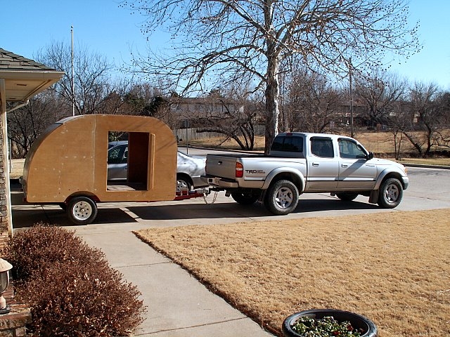 Hitched up for 1st tow - to be pulled to my son's paint shop for finishing.  Its actually closer to done than it looks right now.