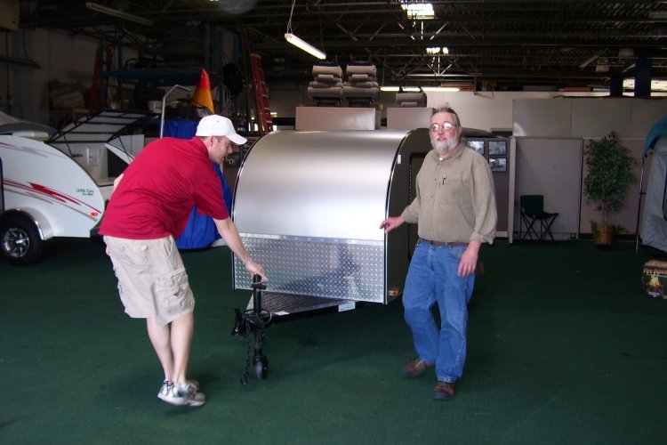 Rolling her out of the showroom at Little Guy Trailers