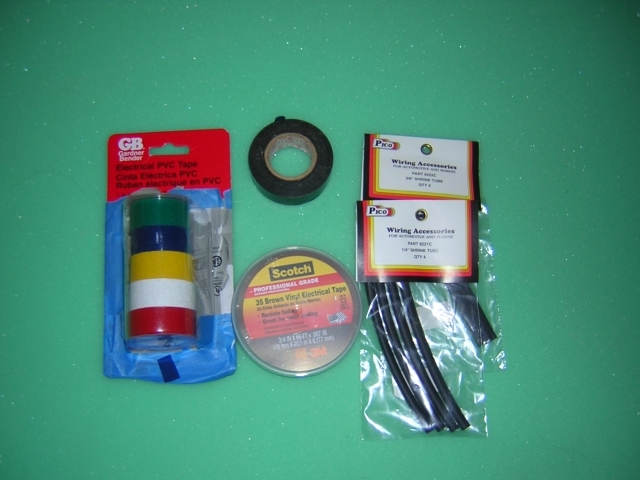 Shrink sleeves come in many sizes.  Tape is used to ID wire lines.