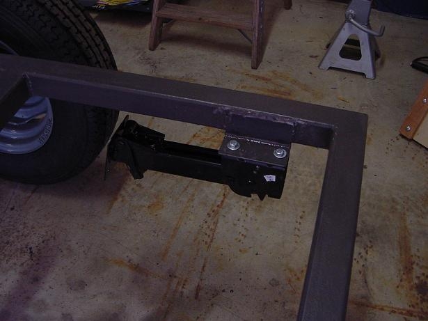 Leveler bolted on angle bracket mount