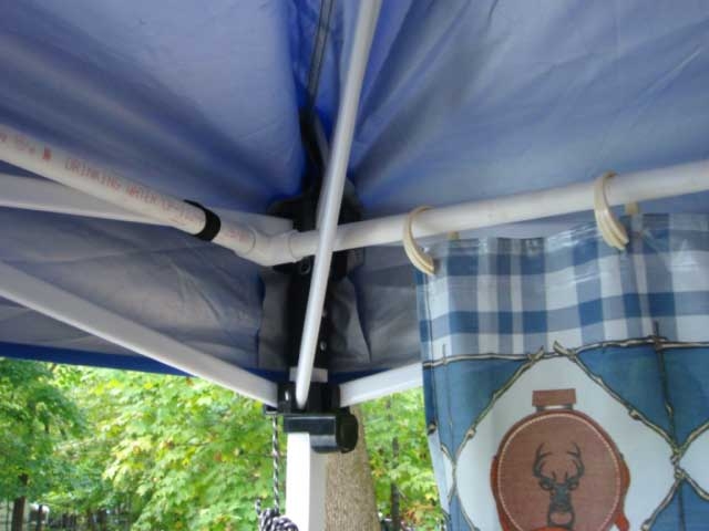 PVC frame attached with velcro strips to EZ up frame