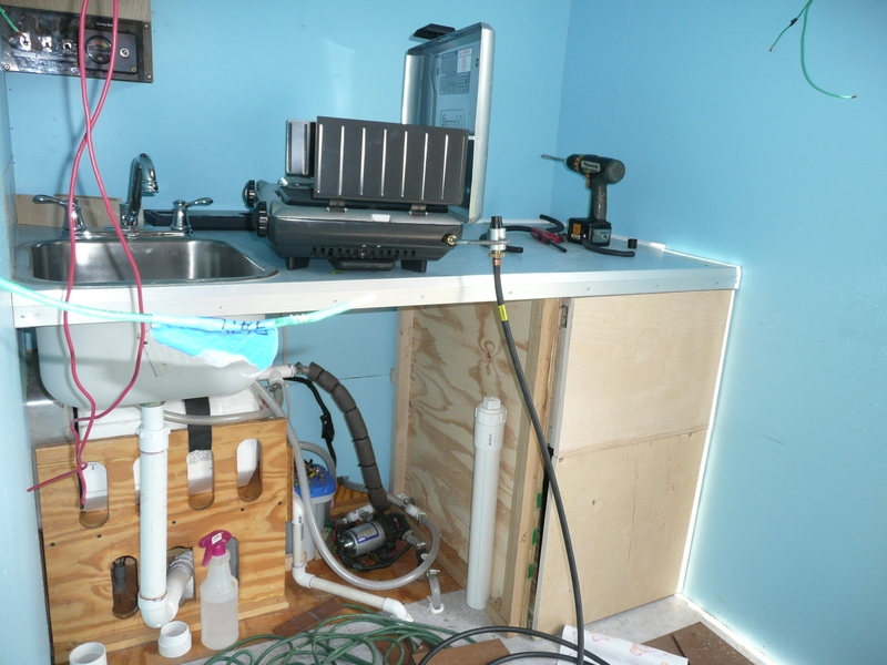 Installing extend a flow gas line to cook stove.