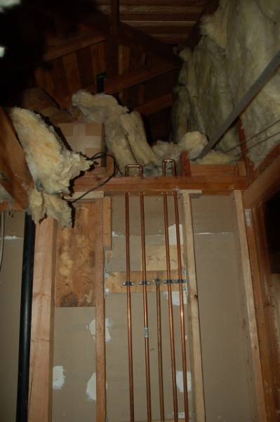 shower pipes looped in attic