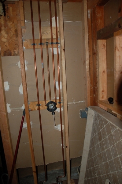 shower pipes from slab to attic to valve