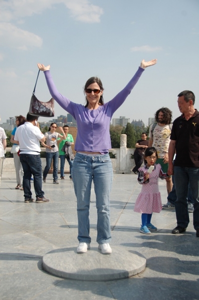 Suzy on disc at the center of platform at Heavenly Garden