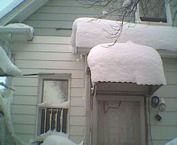 Snow on rear of house