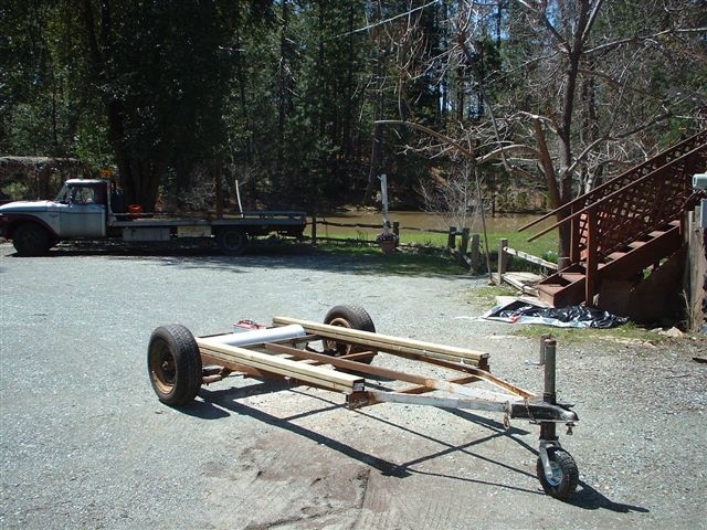 212  trailer in front of our home looking at our pond . 30 miles from yosimite nal park in calil