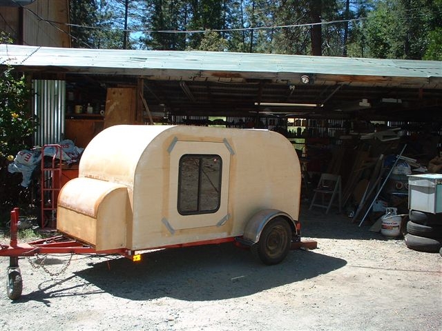 272 the two doors set in place the hold trailer will be glassed to seal it, the edges will be rounded , on the trailer and so I will not need metal edges