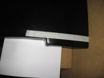 little part past the masking tape is the first part he cut off.