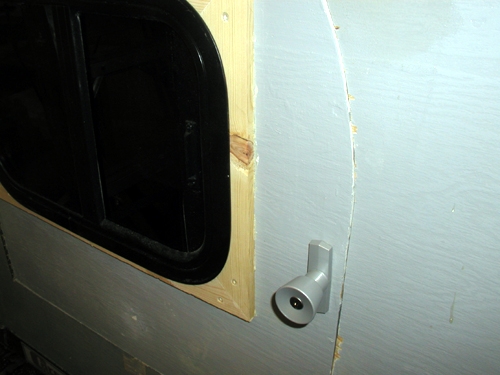 Door Close up after window in before paint and fillers